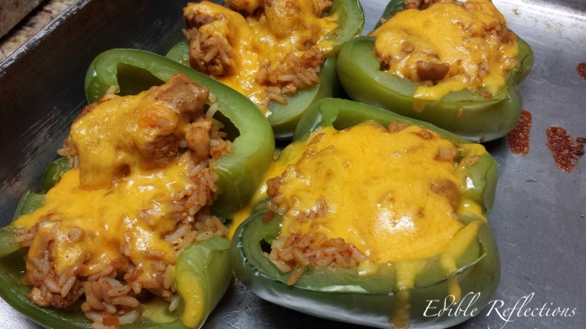 Chicken Taco Stuffed Peppers with melted cheese