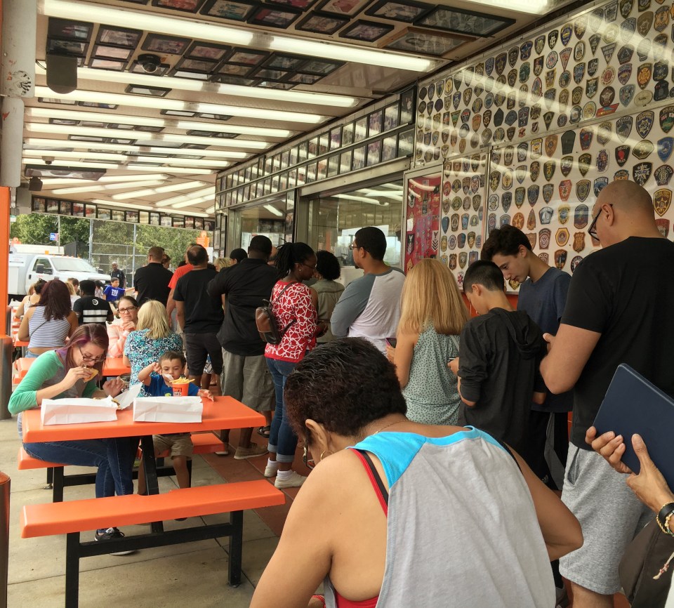 Long line at Geno's Steaks
